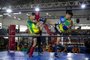 SAPUCAIA DO SUL, RS, BRASIL, 07.10.2023: Campeonato brasileiro de Muay Thai - Na foto: De luvas vermelhas o atleta gaúcho Cauã Machado, 20 anos, participou da luta na categoria 63kg. Foto: Camila Hermes/Agencia RBS<!-- NICAID(15563138) -->