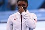 USA's Simone Biles reacts prior to compete in the vault event of the artistic gymnastics women's team final during the Tokyo 2020 Olympic Games at the Ariake Gymnastics Centre in Tokyo on July 27, 2021. (Photo by Lionel BONAVENTURE / AFP)Editoria: SPOLocal: TokyoIndexador: LIONEL BONAVENTURESecao: gymnasticsFonte: AFPFotógrafo: STF<!-- NICAID(14845559) -->