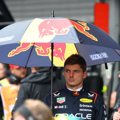 Red Bull Racing's Dutch driver Max Verstappen looks on after a red flag delayed the start of the Formula One Belgian Grand Prix at the Spa-Francorchamps circuit in Spa, on July 27, 2025. (Photo by YVES HERMAN / POOL / AFP)<!-- NICAID(16091845) -->