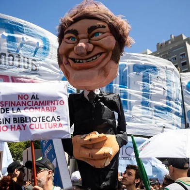 A puppet of Argentina's President Javier Milei is seen during a demonstration during a national strike against the government of Javier Milei in downtown Buenos Aires, on January 24, 2024. Argentine President Javier Milei faces the first national strike in just 45 days of government, against his draconian fiscal adjustment and his plan to reform more than a thousand laws and regulations that governed for decades. The largest Argentine union called the strike in rejection, in particular, of the changes by decree to the labor regime promoted by Milei, which limit the right to strike and affect the financing of unions. (Photo by TOMAS CUESTA / AFP)Editoria: POLLocal: Buenos AiresIndexador: TOMAS CUESTASecao: strikeFonte: AFPFotógrafo: STF<!-- NICAID(15658717) -->
