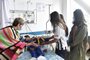This handout picture released by the Colombian Presidency shows Colombia's First Lady Veronica Alcocer (L) and Sofia Petro (R), daughter of Colombian President Gustavo Petro, visiting one of the four Indigenous children who were found alive after being lost for 40 days in the Colombian Amazon rainforest following a plane crash, at the Military Hospital in Bogota on June 10, 2023. Four Indigenous children who had been missing for more than a month in the Colombian Amazon rainforest were found alive and flown to the capital Bogota early Saturday. The children, who survived a small plane crash in the jungle, were transported by army medical plane to a military airport at around 00:30 am Saturday (0530 GMT). (Photo by Prensa presidencial / Colombian Presidency / AFP) / RESTRICTED TO EDITORIAL USE - MANDATORY CREDIT "AFP PHOTO / COLOMBIAN PRESIDENCY" - NO MARKETING NO ADVERTISING CAMPAIGNS - DISTRIBUTED AS A SERVICE TO CLIENTS<!-- NICAID(15453239) -->