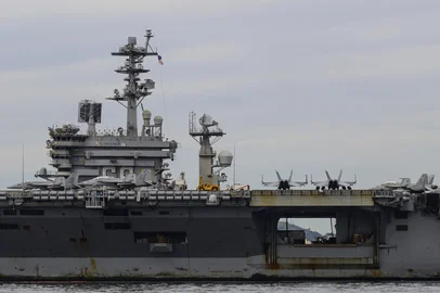 The USS Nimitz (CVN-68) aircraft carrier is seen in Guanabara Bay in Rio de Janeiro, Brazil, on May 8, 2026. (Photo by Pablo PORCIUNCULA / AFP)<!-- NICAID(16283344) -->