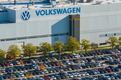 Aerial view taken on October 28, 2024 shows the plant of German car maker Volkswagen (VW) in Zwickau, eastern Germany. Ailing auto giant Volkswagen plans to close at least three factories in Germany and slash tens of thousands of jobs as part of drastic cost-savings drive, workers' representatives said on October 28, 2024, calling the proposed cuts "of historic dimensions". The plan laid out by management, which affects the namesake VW brand, also includes a 10-percent pay cut for all staff, the company's powerful works council said in an update to staff. (Photo by AFP)<!-- NICAID(15901152) -->