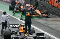 Red Bull Racing's Dutch driver Max Verstappen celebrates after winning the Formula One Sao Paulo Grand Prix, at the Jose Carlos Pace racetrack, aka Interlagos, in Sao Paulo, Brazil, on November 3, 2024. (Photo by NELSON ALMEIDA / AFP)<!-- NICAID(15905965) -->