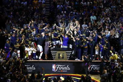 DENVER, COLORADO - JUNE 12: Denver Nuggets owner Stan Kroenke raises the Larry O'Brien Championship Trophy after a 94-89 victory against the Miami Heat in Game Five of the 2023 NBA Finals to win the NBA Championship at Ball Arena on June 12, 2023 in Denver, Colorado. NOTE TO USER: User expressly acknowledges and agrees that, by downloading and or using this photograph, User is consenting to the terms and conditions of the Getty Images License Agreement.   Justin Edmonds/Getty Images/AFP (Photo by Justin Edmonds / GETTY IMAGES NORTH AMERICA / Getty Images via AFP)<!-- NICAID(15454475) -->