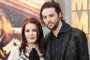 552683021Actress Priscilla Presley (L) and musician Navarone Garibaldi attend the premiere of Warner Bros. Pictures 'Mad Max: Fury Road' at TCL Chinese Theatre, in Los Angeles, California, May 7, 2015.  AFP PHOTO / Valerie Macon (Photo by VALERIE MACON / AFP)Editoria: ACELocal: Los AngelesIndexador: VALERIE MACONSecao: cinemaFonte: AFPFotógrafo: STR<!-- NICAID(15412816) -->