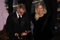 US filmmaker Paul Thomas Anderson and US producer Sara Murphy accept the award for Best Picture for "One Battle After Another" onstage during the 98th Annual Academy Awards at the Dolby Theatre in Hollywood, California on March 15, 2026. (Photo by Patrick T. Fallon / AFP)<!-- NICAID(16245825) -->