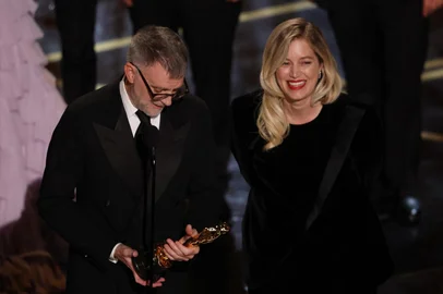 US filmmaker Paul Thomas Anderson and US producer Sara Murphy accept the award for Best Picture for "One Battle After Another" onstage during the 98th Annual Academy Awards at the Dolby Theatre in Hollywood, California on March 15, 2026. (Photo by Patrick T. Fallon / AFP)<!-- NICAID(16245825) -->