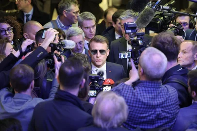 France's President Emmanuel Macron speaks to the press after delivering a speech during the World Economic Forum (WEF) annual meeting in Davos on January 20, 2026. The World Economic Forum takes place in Davos from January 19 to January 23, 2026. (Photo by Ludovic MARIN / AFP)<!-- NICAID(16207544) -->