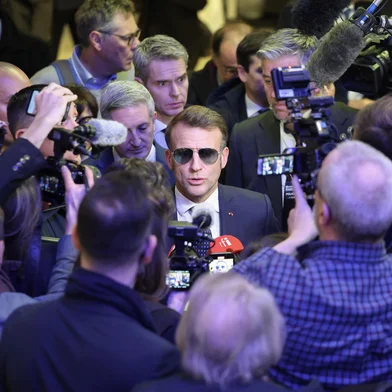 France's President Emmanuel Macron speaks to the press after delivering a speech during the World Economic Forum (WEF) annual meeting in Davos on January 20, 2026. The World Economic Forum takes place in Davos from January 19 to January 23, 2026. (Photo by Ludovic MARIN / AFP)<!-- NICAID(16207544) -->