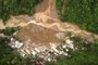 This screengrab from AFPTV aerial video footage taken on February 7, 2024 shows the site of a landslide in Davao de Oro province on Mindanao island in the southern Philippines. At least five people were killed and 31 injured when a rain-induced landslide engulfed two buses and houses in a mountainous region of the southern Philippines, an official said on February 7. (Photo by Renante Naparan / AFPTV / AFP)<!-- NICAID(15671906) -->