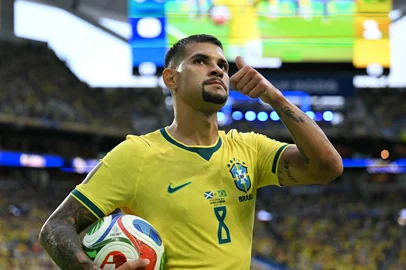 Brazil's midfielder #08 Bruno Guimaraes gestures during the 2026 World Cup Group C football match between Scotland and Brazil at the Miami Stadium in Miami Gardens on June 24, 2026.  (Photo by CHANDAN KHANNA / AFP)<!-- NICAID(16319292) -->