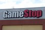 The GameStop logo sign is seen above the store in Culver City, California on January 28, 2021. - An epic battle is unfolding on Wall Street, with a cast of characters clashing over the fate of GameStop, a struggling chain of video game retail stores. The conflict has sent GameStop on a stomach-churning ride with amateur investors taking on the financial establishment in the mindset of the Occupy Wall Street movement launched a decade ago. (Photo by Chris DELMAS / AFP)<!-- NICAID(14702120) -->
