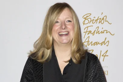 (FILES) British fashion designer Sarah Burton,  creative director of fashion brand Alexander McQueen and the designer of Catherine Middleton's dress for her wedding to Prince William, Duke of Cambridge,  poses in the winners' room with the Red Carpet Designers award during the British Fashion Awards 2014 in London on December 1, 2014. Givenchy announced on a press release on September 9, 2024 the appointment of British fashion designer Sarah Burton as their new artistic director. (Photo by Justin TALLIS / AFP)<!-- NICAID(15861790) -->