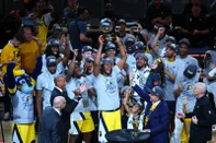 INDIANAPOLIS, IN - MAY 31: The Indiana Pacers celebrate with the Bob Cousy Eastern Conference Finals trophy after defeating the New York Knicks during Game 6 of the 2025 Eastern Conference Finals on May 31, 2025 at Gainbridge Fieldhouse in Indianapolis, Indiana. NOTE TO :  expressly acknowledges and agrees that, by ing and or using this Photograph,  is consenting to the  and conditions of the Getty Images License Agreement. Mandatory Copyright Notice: Copyright 2025 NBAE David L. Nemec /NBAE via Getty Images/AFP
