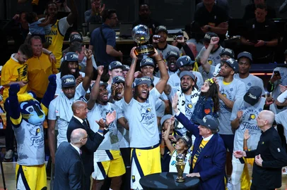 INDIANAPOLIS, IN - MAY 31: The Indiana Pacers celebrate with the Bob Cousy Eastern Conference Finals trophy after defeating the New York Knicks during Game 6 of the 2025 Eastern Conference Finals on May 31, 2025 at Gainbridge Fieldhouse in Indianapolis, Indiana. NOTE TO USER: User expressly acknowledges and agrees that, by downloading and or using this Photograph, user is consenting to the terms and conditions of the Getty Images License Agreement. Mandatory Copyright Notice: Copyright 2025 NBAE David L. Nemec /NBAE via Getty Images/AFP