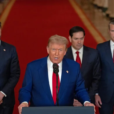 US President Donald Trump addresses the nation, alongside US Vice President JD Vance (L), US Secretary of State Marco Rubio (2nd R) and US Secretary of Defense Pete Hegseth (R), from the White House in Washington, DC on June 21, 2025, following the announcement that the US bombed nuclear sites in Iran. President Donald Trump said June 21, 2025 the US military has carried out a "very successful attack" on three Iranian nuclear sites, including the underground uranium enrichment facility at Fordo. "We have completed our very successful attack on the three Nuclear sites in Iran, including Fordow, Natanz, and Esfahan," Trump said in a post on his Truth Social platform. (Photo by CARLOS BARRIA / POOL / AFP)<!-- NICAID(16064897) -->