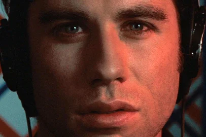 John Travolta em Um Tiro na Noite (1981), de Brian De Palma<!-- NICAID(14779850) -->