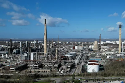 An aerial view shows Stanlow Refinery, an oil refinery owned by Essar Energy in Ellesmere Port, northwest England on March 11, 2026.Energy in Ellesmere Port, northwest England on March 11, 2026. World oil prices surged more than five percent on March 11 as the Middle East war disrupted crude exports. (Photo by Paul ELLIS / AFP)<!-- NICAID(16242637) -->