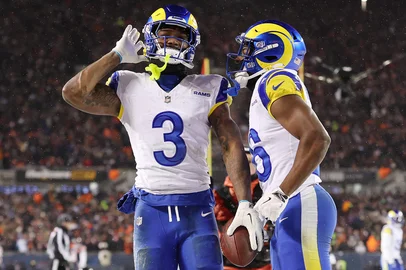 CHICAGO, ILLINOIS - JANUARY 18: Kam Curl #3 of the Los Angeles Rams celebrates after his interception against the Chicago Bears with Kamren Kinchens #26 during overtime in the NFC Divisional Playoffs at Soldier Field on January 18, 2026 in Chicago, Illinois.   Michael Reaves/Getty Images/AFP (Photo by Michael Reaves / GETTY IMAGES NORTH AMERICA / Getty Images via AFP)<!-- NICAID(16208262) -->