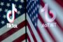 (FILES) This photo illustration shows the TikTok logo reflected in an image of the US flag, in Washington, DC, on March 16, 2023. The US House of Representatives overwhelmingly approved a bill on March 13, 2024 that would force Tiktok to divest from its Chinese owner or get banned from the United States. (Photo by Stefani Reynolds / AFP)Editoria: POLLocal: WashingtonIndexador: STEFANI REYNOLDSSecao: mass mediaFonte: AFPFotógrafo: STF<!-- NICAID(15704618) -->