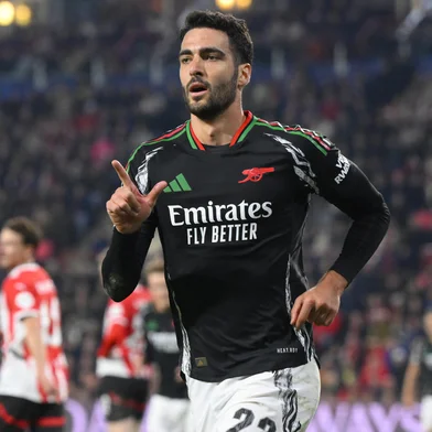 Arsenal's Spanish midfielder #23 Mikel Merino celebrates scoring his team's third goal during the UEFA Champions League round of 16 first leg football match between PSV Eindhoven (NED) and Arsenal FC (ENG) at the the PSV Stadion, in Eindhoven, on March 4, 2025. (Photo by JOHN THYS / AFP)<!-- NICAID(15993774) -->