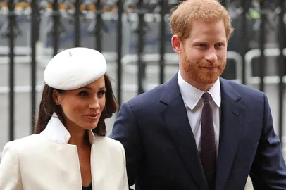 (FILES) In this file photo Britain's Prince Harry (R) and Meghan Markle attend a Commonwealth Day Service at Westminster Abbey in central London, on March 12, 2018. - Britain's Prince Harry, who has blamed press intrusion for contributing to his mother Princess Diana's death in 1997, has told US chat show host Oprah Winfrey he was worried about history repeating itself. Harry and his wife Meghan Markle rocked Britain's monarchy with their shock announcement in January 2020 that they were stepping back from royal duties. CBS on February 28, 2021 released brief clips of an "intimate" interview with Winfrey about their lives which will air March 7. (Photo by Daniel LEAL-OLIVAS / AFP)<!-- NICAID(14736946) -->