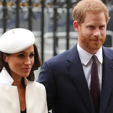 (FILES) In this file photo Britain's Prince Harry (R) and Meghan Markle attend a Commonwealth Day Service at Westminster Abbey in central London, on March 12, 2018. - Britain's Prince Harry, who has blamed press intrusion for contributing to his mother Princess Diana's death in 1997, has told US chat show host Oprah Winfrey he was worried about history repeating itself. Harry and his wife Meghan Markle rocked Britain's monarchy with their shock announcement in January 2020 that they were stepping back from royal duties. CBS on February 28, 2021 released brief clips of an "intimate" interview with Winfrey about their lives which will air March 7. (Photo by Daniel LEAL-OLIVAS / AFP)<!-- NICAID(14736946) -->