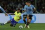 Brazil's forward Gabriel Jesus (L) and Uruguay's midfielder Manuel Ugarte (R) fight for the ball during the 2026 FIFA World Cup South American qualification football match between Uruguay and Colombia at the Centenario Stadium in Montevideo on October 17, 2023. (Photo by Pablo PORCIUNCULA / AFP)Editoria: SPOLocal: MontevideoIndexador: PABLO PORCIUNCULASecao: soccerFonte: AFPFotógrafo: STF<!-- NICAID(15571822) -->