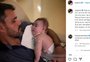 Emocionado, Juliano Cazarré posta foto com a filha caçula no colo