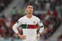 Portugal's forward #07 Cristiano Ronaldo reacts during the Qatar 2022 World Cup quarter-final football match between Morocco and Portugal at the Al-Thumama Stadium in Doha on December 10, 2022. (Photo by Alberto PIZZOLI / AFP)Editoria: SPOLocal: DohaIndexador: ALBERTO PIZZOLISecao: soccerFonte: AFPFotógrafo: STF<!-- NICAID(15308745) -->