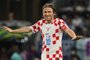 Croatia's midfielder #10 Luka Modric gestures as he is substituted during the Qatar 2022 World Cup round of 16 football match between Japan and Croatia at the Al-Janoub Stadium in Al-Wakrah, south of Doha on December 5, 2022. (Photo by ANDREJ ISAKOVIC / AFP)<!-- NICAID(15286184) -->