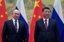 Russian President Vladimir Putin (L) and Chinese President Xi Jinping pose during their meeting in Beijing, on February 4, 2022. (Photo by Alexei Druzhinin / Sputnik / AFP)Editoria: POLLocal: BeijingIndexador: ALEXEI DRUZHININSecao: diplomacyFonte: SputnikFotógrafo: STR<!-- NICAID(15007263) -->
