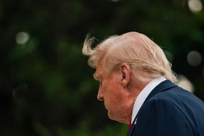 US President Donald Trump walks on the South Lawn upon arrival at the White House in Washinton, DC, on July 13, 2025 after attending the 2025 FIFA Club World Cup final in New Jersey. (Photo by Allison ROBBERT / AFP)<!-- NICAID(16081273) -->
