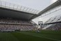 Football players line up before the Brazilian championship football match between Corinthians and Figueirense as part of the official inauguration of the Arena de Sao Paulo stadium, on May 18, 2014, in Sao Paulo, Brazil. The Arena de Sao Paulo, of Brazilian team Corinthians, will host the opening match of the Brazil 2014 FIFA World Cup between Brazil and Croatia on June 12. AFP PHOTO / NELSON ALMEIDA<!-- NICAID(10502429) -->