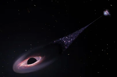 Imagem de um buraco negro que pode ter sido formado a partir da colisão de três galáxias. O registro foi obtido com o uso do telescópio espacial Hubble, da Agência Espacial Norte-Americana (Nasa)<!-- NICAID(15399420) -->