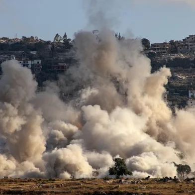 This photograph taken from the southern Lebanese village of al-Haniyya shows smoke as it rises from the site of an Israeli airstrike that targeted the village of al-Mansouri on September 10, 2026. (Photo by Kawnat HAJU / AFP) / <!-- NICAID(16363453) -->