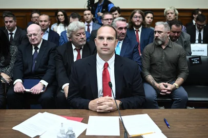 David Grusch, former National Reconnaissance Officer Representative on the Unidentified Anomalous Phenomena Task Force, arrives to testify during a House Subcommittee on National Security, the Border, and Foreign Affairs hearing titled "Unidentified Anomalous Phenomena: Implications on National Security Public Safety and Government Transparency," on Capitol Hill in Washington, DC, on July 26, 2023. (Photo by Brendan SMIALOWSKI / AFP)Editoria: SCILocal: WashingtonIndexador: BRENDAN SMIALOWSKISecao: national securityFonte: AFPFotógrafo: STF<!-- NICAID(15493121) -->