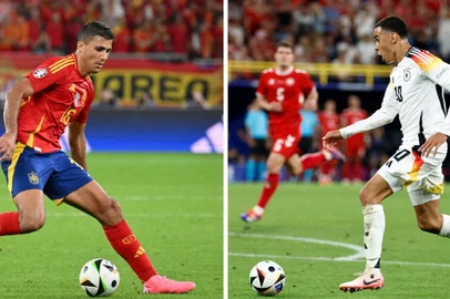 (COMBO) This combination file photos made on July 3, 2024, shows, at left Spain's midfielder #16 Rodri during the UEFA Euro 2024 Group B football match between Spain and Italy at the Arena AufSchalke in Gelsenkirchen on June 20, 2024; and, at right, Germany's midfielder #10 Jamal Musiala during the UEFA Euro 2024 round of 16 football match between Germany and Denmark at the BVB Stadion Dortmund in Dortmund on June 29, 2024. Spain will play against Germany in a UEFA Euro 2024 quarter-final football match at the Stuttgart Arena in Stuttgart on July 5, 2024. (Photo by Alberto PIZZOLI and Kenzo TRIBOUILLARD / AFP)<!-- NICAID(15804357) -->