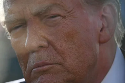 US President Donald Trump speaks to reporters after stepping off Air Force One upon arrival at Joint Base Andrews, Maryland on July 15, 2025. Trump is returning from Pittsburgh, Pennsylvania, after speaking at the Pennsylvania Energy and Innovation Summit on the campus of Carnegie Mellon University. (Photo by ANDREW CABALLERO-REYNOLDS / AFP)<!-- NICAID(16081315) -->
