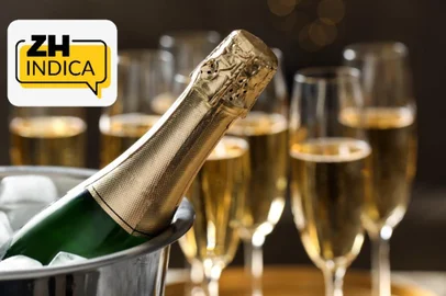 Reprodução / adobe.stock.com White chalk stones from Cote des Blancs near Epernay, region Champagne, France, glass of blanc de blancs champagne from grand cru vineyards in Cramant and white chardonnay grapes close up<!-- NICAID(16204658) -->