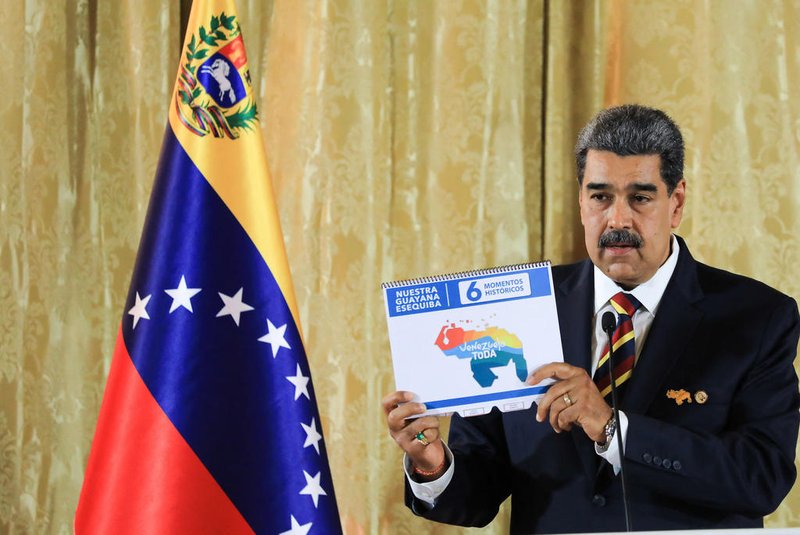 This handout picture released by the Venezuelan Presidency shows Venezuelan President Nicolas Maduro speaking during an act to present the Organic Law for the Defense of "Guyana Esequiba" at the National Assembly in Caracas on April 3, 2024. Venezuelan President Nicolás Maduro denounced on Wednesday the installation of "secret military bases" of the United States in the Essequibo, an oil-rich area that his country disputes with Guyana. (Photo by JHONN ZERPA / Venezuelan Presidency / AFP) / RESTRICTED TO EDITORIAL USE - MANDATORY CREDIT "AFP PHOTO / VENEZUELAN PRESIDENCY / Jhon ZERPA" - NO MARKETING - NO ADVERTISING CAMPAIGNS - DISTRIBUTED AS A SERVICE TO CLIENTS<!-- NICAID(15724934) -->