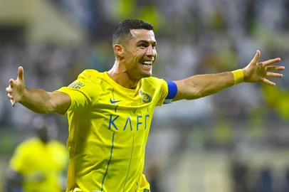 Nassr's Portuguese forward #07 Cristiano Ronaldo celebrates after scoring during the Saudi Pro League football match between Al-Nassr and Al-Fateh at the Prince Abdullah Bin Jalawi Stadium in al-Hasa, on August 25, 2023. (Photo by Ali Al-HAJI / AFP)Editoria: SPOLocal: Al-HasaIndexador: ALI AL-HAJISecao: soccerFonte: AFPFotógrafo: STR<!-- NICAID(15521172) -->