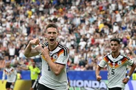 Germany's defender #15 Nico Schlotterbeck celebrates after scoring his team's second goal  during the 2026 World Cup Group E football match between Germany and Curacao at the Houston Stadium in Houston on June 14, 2026.  (Photo by RONALDO SCHEMIDT / AFP)<!-- NICAID(16306033) -->