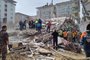 Rescuers carry on search operations among the rubble of collapsed buildings in the Yesilyurt district of Malatya on February 27, 2023 after a 5,6 magnitude earthquake hit eastern Turkey, killing one person and wounding dozens others while causing some damaged buildings to collapse, the government's disaster agency said. - The epicentre of the tremor was the Yesilyurt district in the Malatya province, which was hit by the February 6 earthquake that killed over 44,000 people in Turkey and thousands more in neighbouring Syria. (Photo by DHA (Demiroren News Agency) / AFP) / - Turkey OUT / RESTRICTED TO EDITORIAL USE - MANDATORY CREDIT "AFP PHOTO / DHA (Demiroren News Agency) " - NO MARKETING - NO ADVERTISING CAMPAIGNS - DISTRIBUTED AS A SERVICE TO CLIENTS<!-- NICAID(15360477) -->