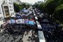 Aerial view of members of social organizations holding a demonstration against the recent economic measures introduced by the government of President Javier Milei in Buenos Aires, on April 10, 2024. Eight people were arrested and at least half a dozen were injured during a demonstration by social organizations in Buenos Aires against the economic measures of Argentine President Javier Milei and in demand of food for soup kitchens. (Photo by LUIS ROBAYO / AFP)<!-- NICAID(15731577) -->