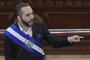 (FILES) Salvadoran President Nayib Bukele delivers his annual address to the nation marking his third year in office at the San Salvador Legislative Assembly on June 1, 2022. El Salvador's gang-busting President Nayib Bukele has proudly embraced the monicker of "dictator" and breezily shrugs off criticism of human rights transgressions. In five years in power, the 42-year-old millennial businessman and former mayor has become globally known, and domestically loved, for his no-holds-barred "war" on drug gangs. (Photo by MARVIN RECINOS / AFP)<!-- NICAID(15669331) -->