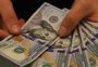 Nem reviravolta de Trump abala: dólar cai abaixo de R$ 5,20 e bolsa bate recorde