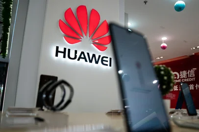 A Huawei logo is displayed at a retail store in Beijing on May 20, 2019. - US internet giant Google, whose Android mobile operating system powers most of the world's smartphones, said it was beginning to cut ties with China's Huawei, which Washington considers a national security threat. (Photo by FRED DUFOUR / AFP)