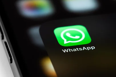 WhatsApp mobile icon app on screen smartphone iPhone macro. WhatsApp is a popular free instant text messaging system for mobile and other platforms. Moscow, Russia - June 15, 2021<!-- NICAID(15767366) -->